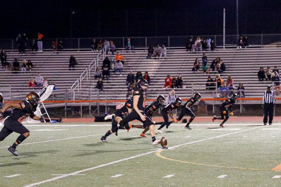 The team kicks off after scoring a touchdown.