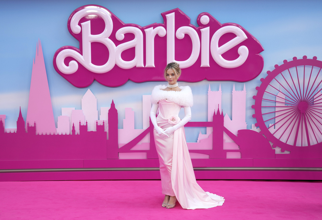 FILE+-+Margot+Robbie+poses+for+photographers+upon+arrival+at+the+premiere+of+the+film+Barbie+on+Wednesday%2C+July+12%2C+2023%2C+in+London.+The+Associated+Press+reported+on+stories+circulating+online+incorrectly+claiming+the+%E2%80%9CBarbie%E2%80%9D+movie+raised+more+money+in+one+day+than+Florida+Gov.+Ron+DeSantis+has+his+entire+life.+%28Scott+Garfitt%2FInvision%2FAP%2C+File%29