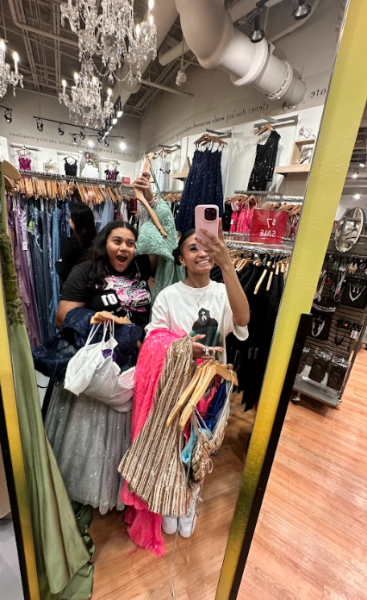 Jasmin Hernandez-Rodriguez and Kiara Charlize Repuyan shopping for prom dresses.