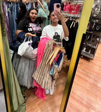 Jasmin Hernandez-Rodriguez and Kiara Charlize Repuyan shopping for prom dresses.