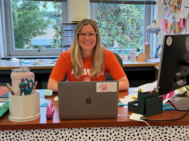 Brittany Eckard working at her desk