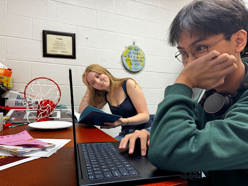Two students feeling stressed with their workload in senior year